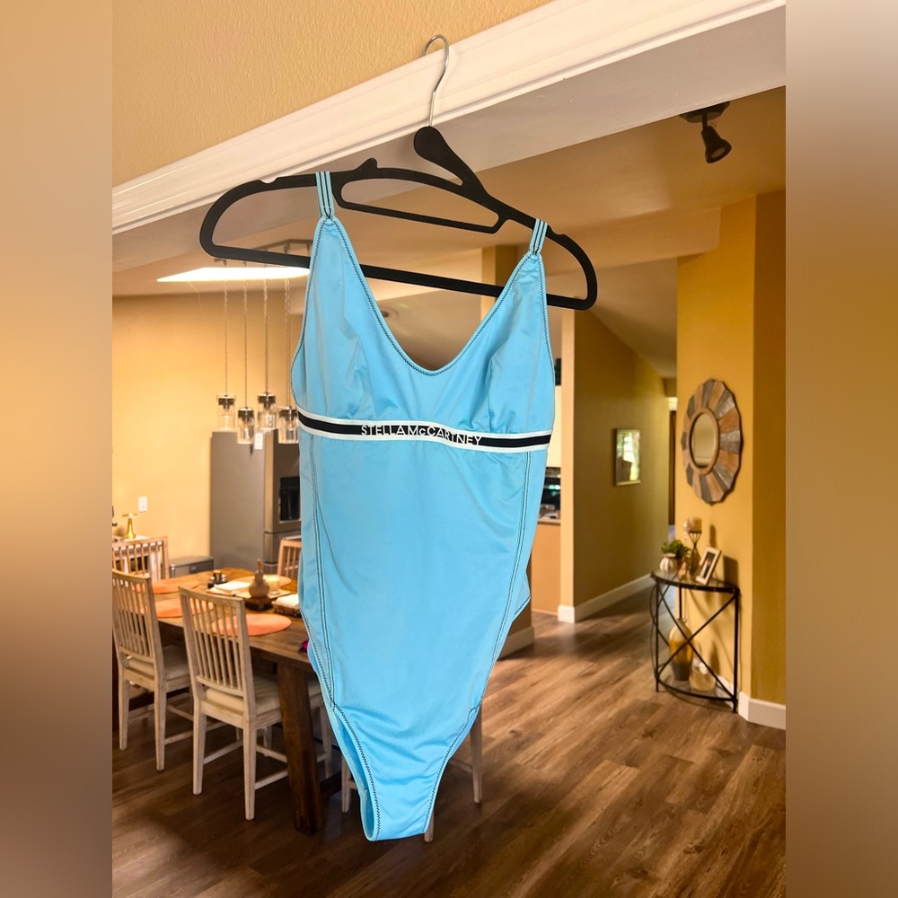 Authentic, blue Stella McCartney one piece swimsuit, no tag, but size Medium.
